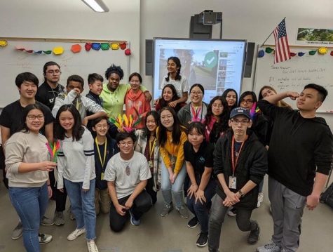 Members of the Chinese Club stand in unison.