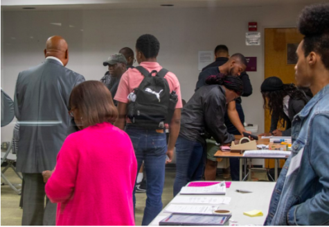 Harris County voters line up for the poll at Gregory Lincoln School.