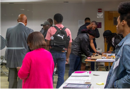 Harris County voters line up for the poll at Gregory Lincoln School. 