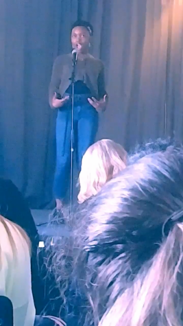 Kechi Mbah performs one of her poems at a local Poetry Slam.