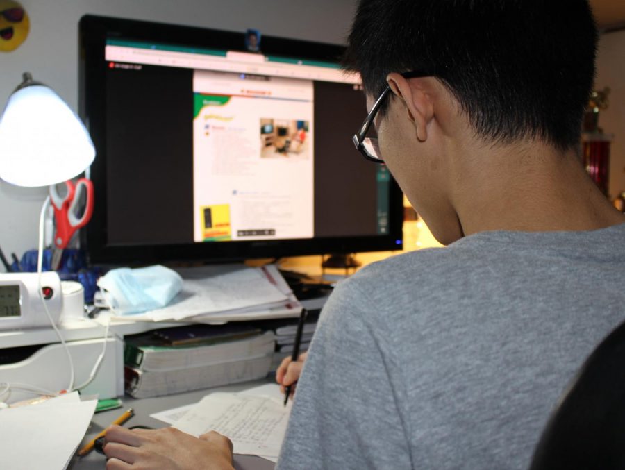 Since schools have closed, students, like Vincent Huynh, have been required to participate in online classes.
