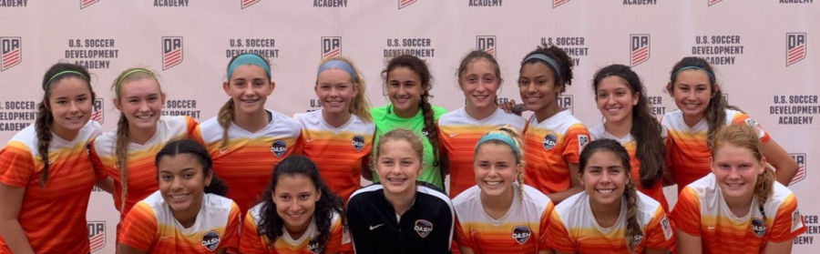 Junior Camille Marlin, in the center, plays midfielder for the competitive club Houston Dash Academy 04. 