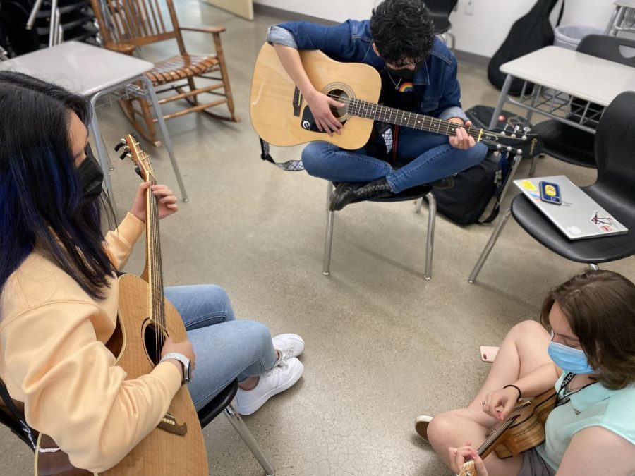 CVHS juniors Katherine Linares and Lily Hurysz and sophomore Caitlin Liman jam during their free time at CVHS. 