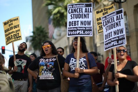 Protestors campaign to cancel student debt. 