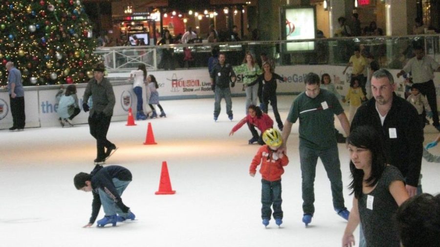 Me and my family Ice Skating at the Galleria around a huge Christmas Tree