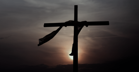 A darkened cross reflects my detachment from my Catholic faith.