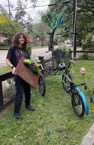 Caoilin Krathaus standing with her submission to the Art Bike Contest. (photo courtesy of Caoilin Krathaus)