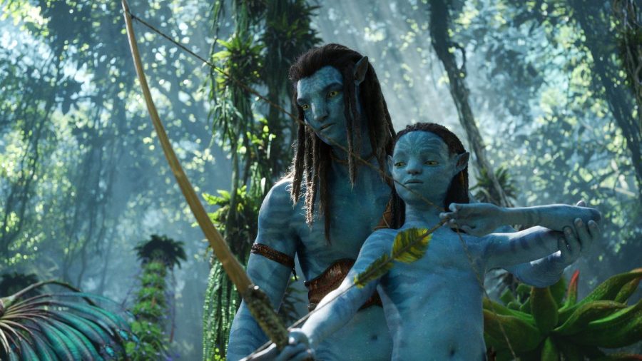 Avatar: The Way of Water focuses largely on the strength of family bonds. Here, Jake Sully is teaching his older son, Neteyam, how to use a bow and arrow. (20th Century Studios)