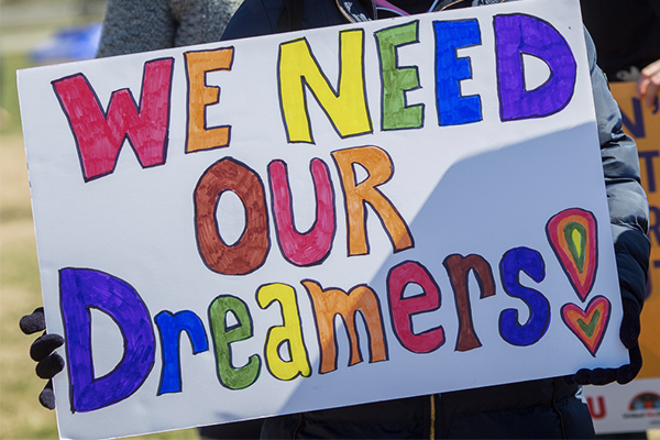 Photo show's Immigrants protesting against the shutting down of DACA.