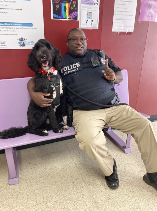 Officer Steven Bennett poses for a picture with his canine unit, Justice (Source: Steven Bennett)