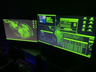 Photo of monitors which relate to how scammers allegedly view victims through the camera.