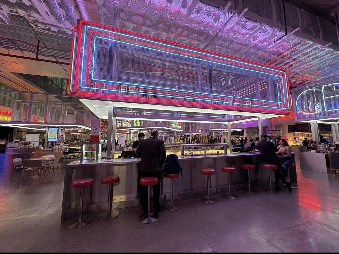 Neon LED lights POST Houstons dinning hub showing modern style lighting within the building.