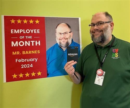 James Barnes winning Employee of the Month for February 2024
