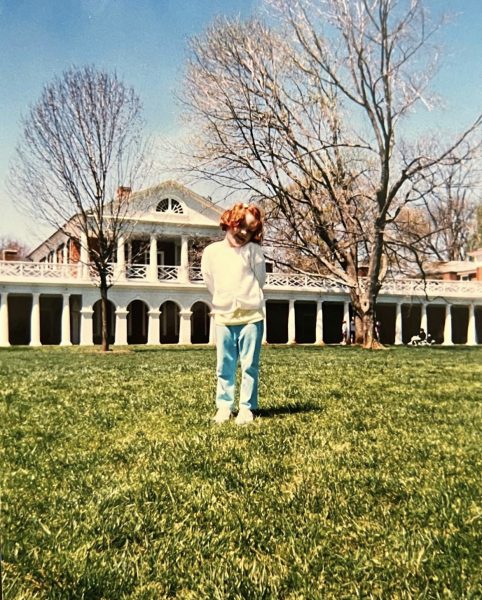 My sister, Claire, standing on UVAs lawn at 6 years old.
