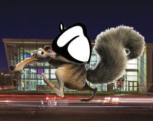 Artistic reprersentation of giant squirrel/Carnegie student running in front of Carnegie carrying College Board acorn