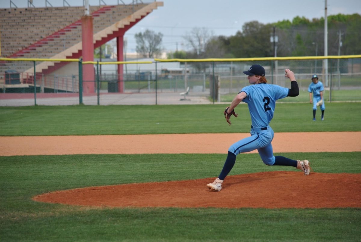 Herce delivering a pitch during a CVHS varsity game