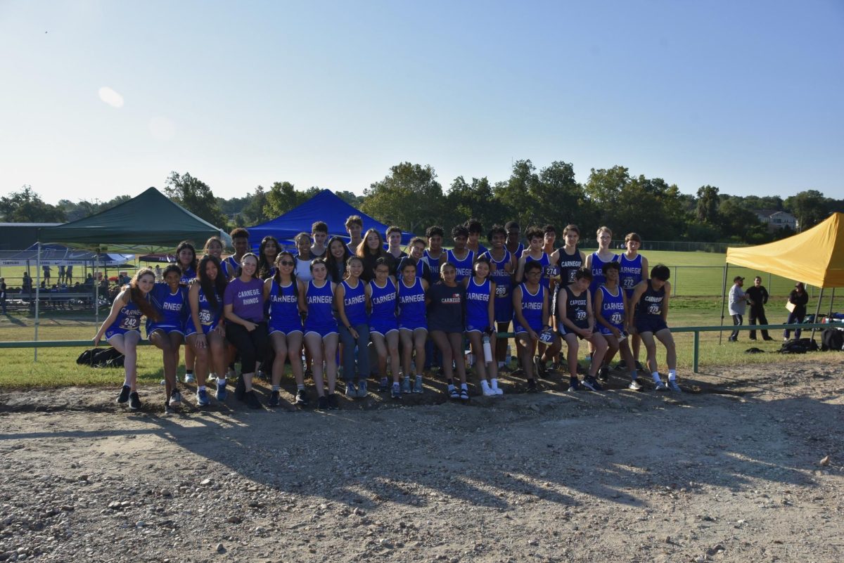 Boys and girls cross country teams at their state competition