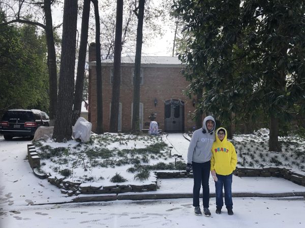 The last picture taken of Singh (on the right) and their house, the night before the fire.