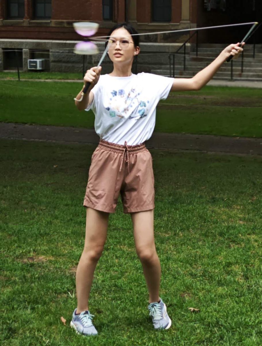 Stephanie Chen spins a diabolo at Harvard Yard in the summer of 2024. Chen was in the New England area to watch the 2024 USA National Diabolo Competition. (Photo courtesy of Stephanie Chen)