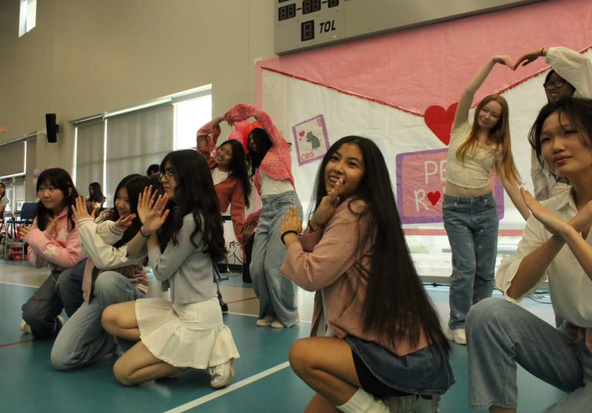 CVHS K-pop club dancers posing during the pep rally performance.