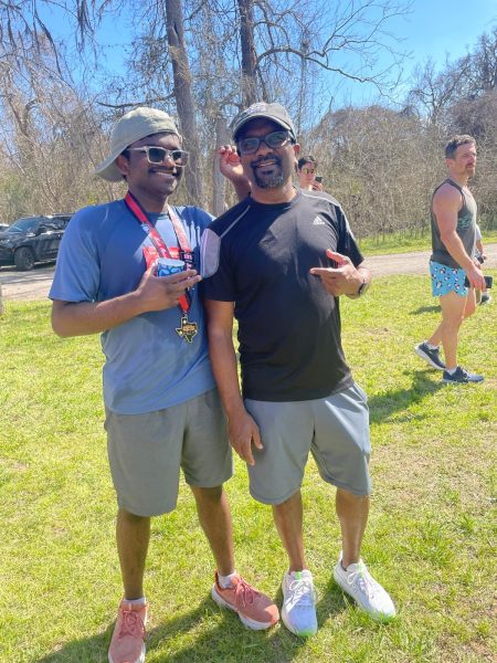 Posing with my dad at a recent half marathon that I completed. Running helped me reduce my anxiety 