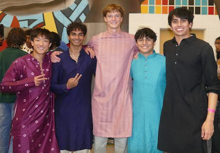 Alex Du, left, poses for a photo in a kurta at the 13th annual CVHS I-Fest.