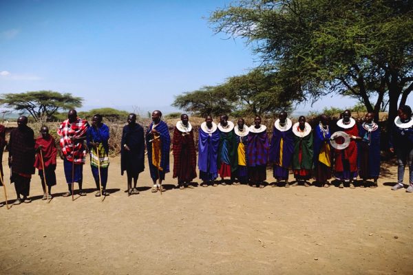 The Masai tribe near the Serengeti performing a traditional dance for visitors. 